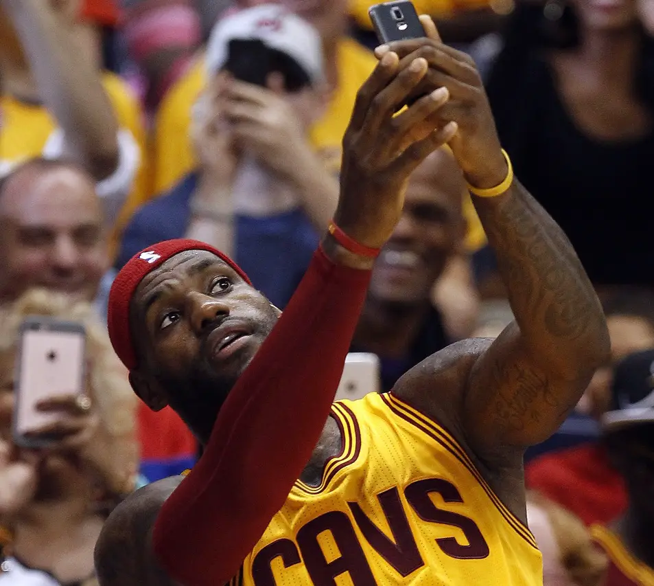 PICS: LeBron Takes A Break & Takes A Selfie With Fans During Preseason